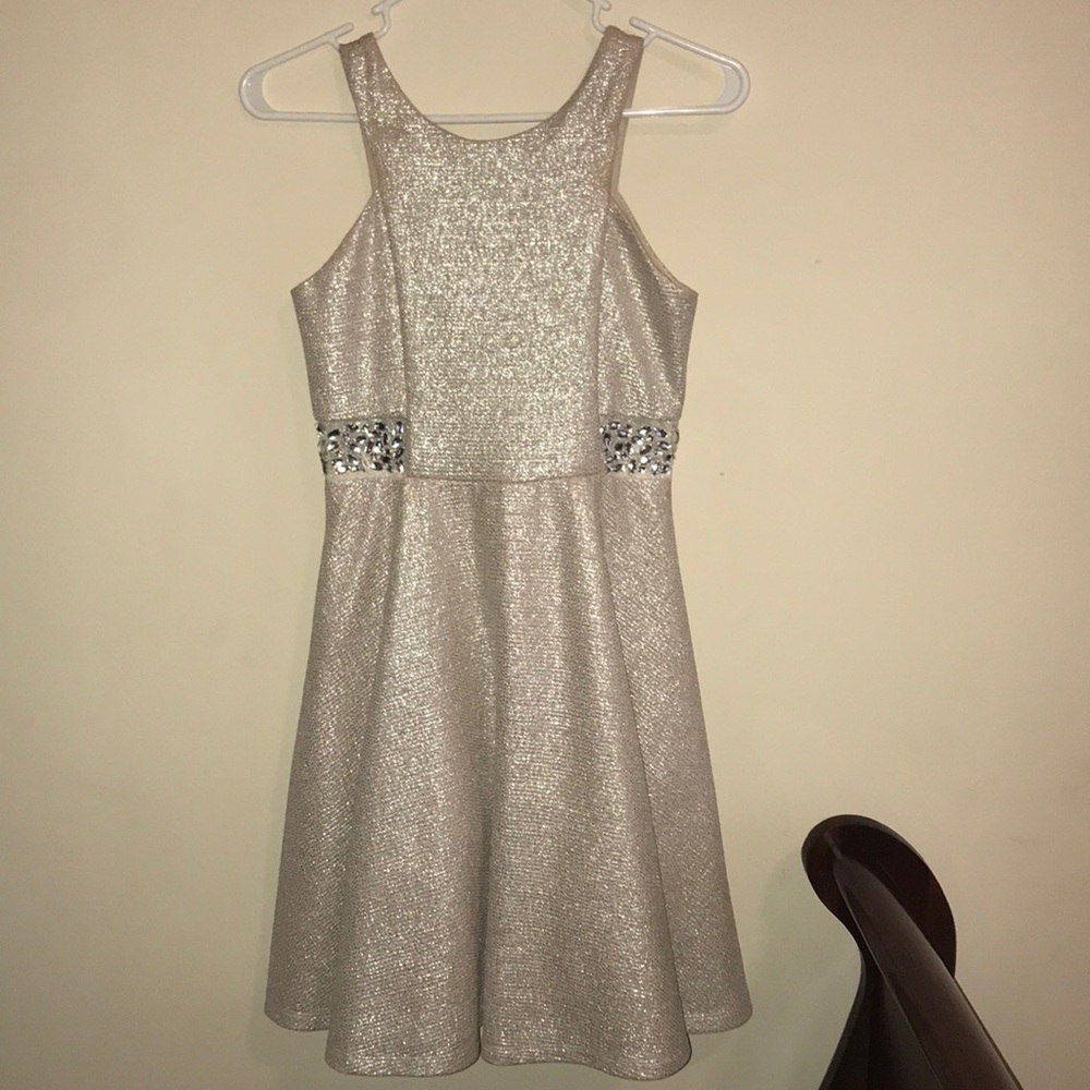 A sparkly, beige dress